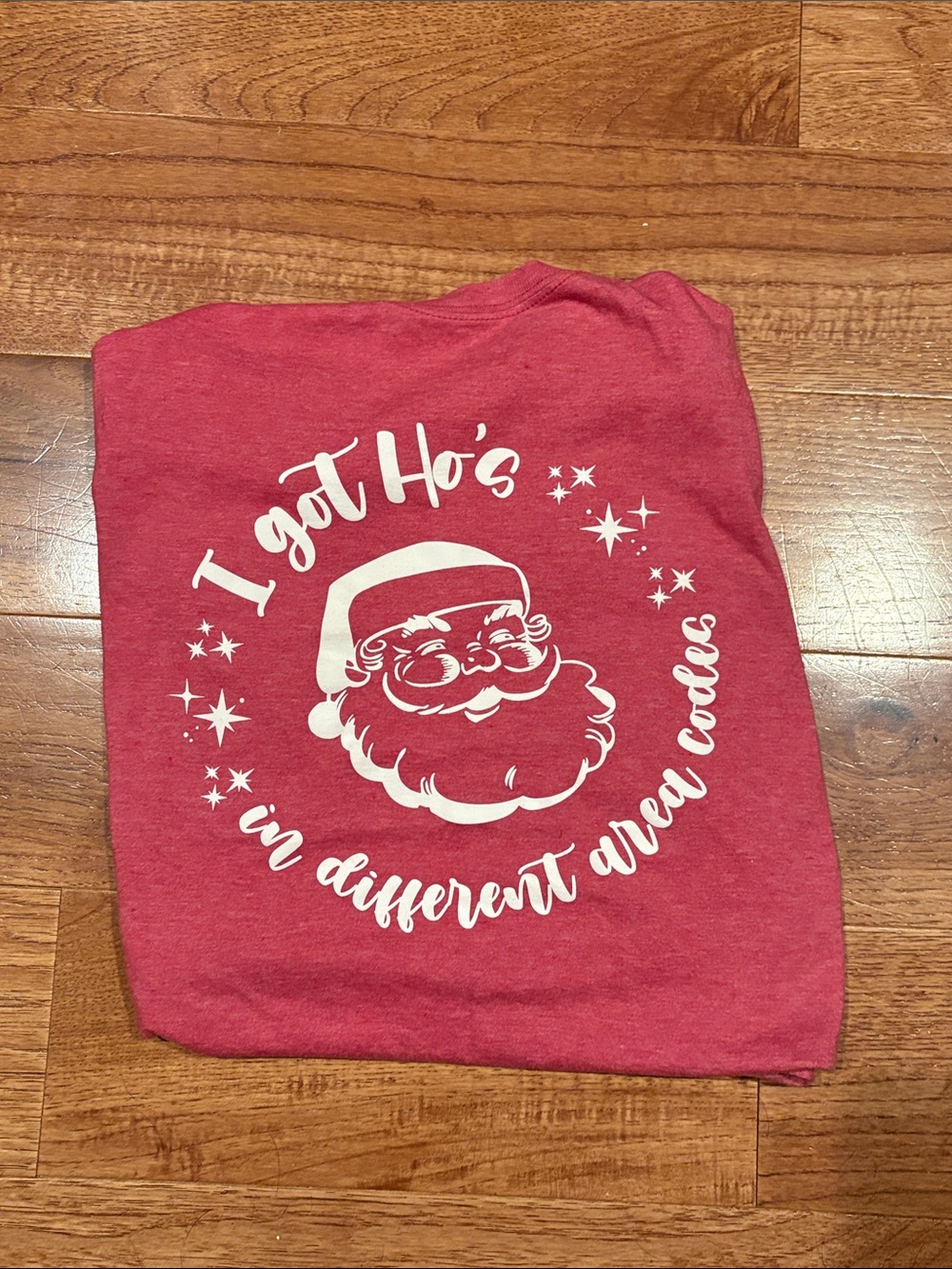 Red Santa Graphic Holiday Tee - 'I got Ho's in different area codes'